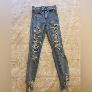 size 6 SUPER distressed extra stretch American Eagle skinny jeans high rise